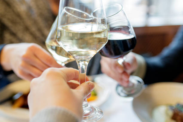 istock Personal perspective of friends toasting with wine 904098370