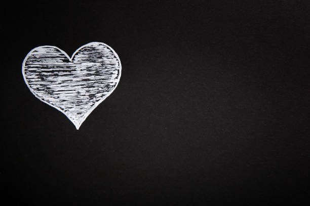 Valentines Day, black background, heart shape, pencil, pen, note paper