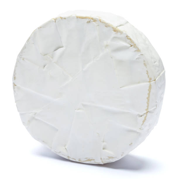 istock Round brie or camambert cheese on a white background 904105482