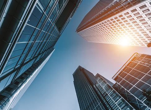 skyscrapers in a finance district from a low angle