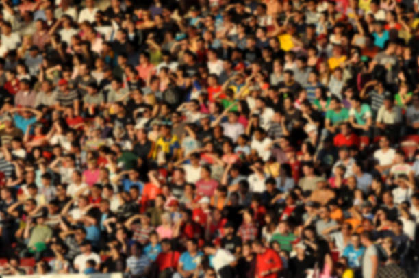 istock Blurred crowd of spectators in a stadium 904106136