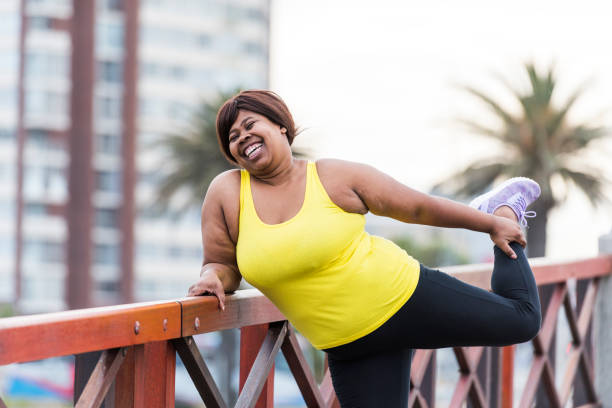 istock Woman stretching on a bridge 904110506