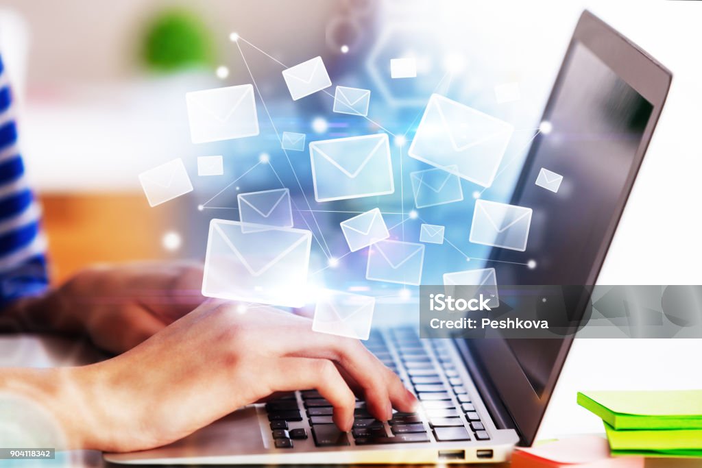 E-mail networking concept Hands using laptop with abstract email interface. E-mail networking concept. 3D Rendering E-Mail Stock Photo