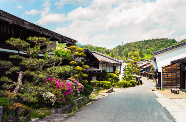 Tsumago - an ancient heritage town in Japan The picturesque main road through the ancient small village of Tsumago in Kiso District, Japan. gunma prefecture stock pictures, royalty-free photos & images