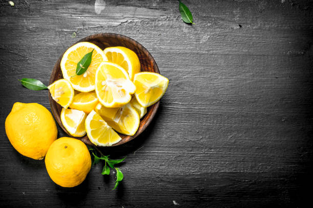 istock Sliced slices of lemons in a bowl. 904119434