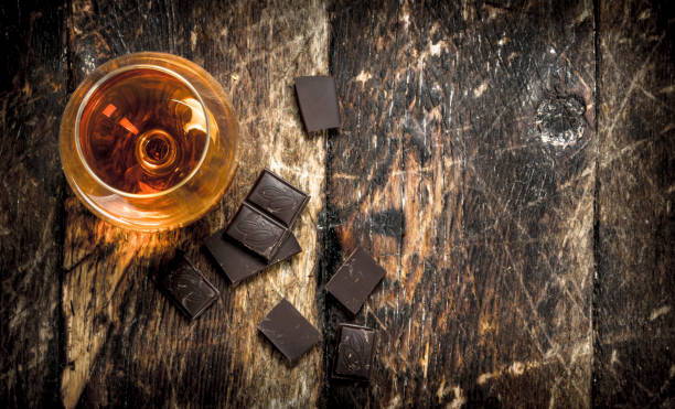 cognac with bitter chocolate. - hard liqueur imagens e fotografias de stock