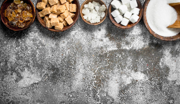 istock Different kinds of sugar in bowls. 904123256