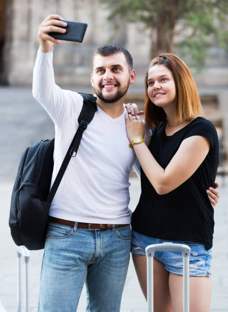 istock Tourists taking photo 904131350