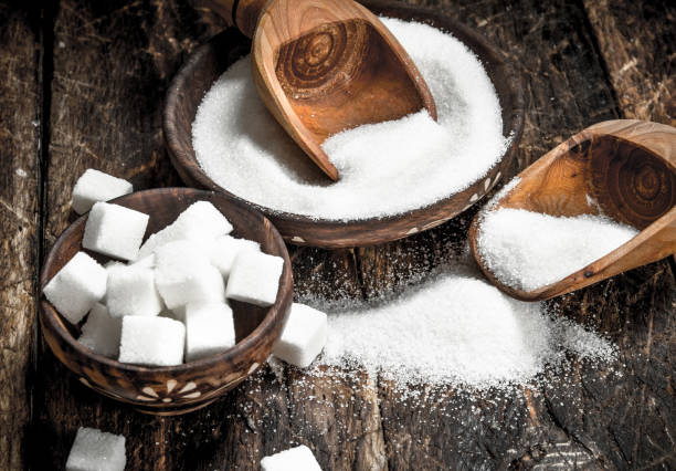 istock Sugar with a scoop in a bowl. 904131374