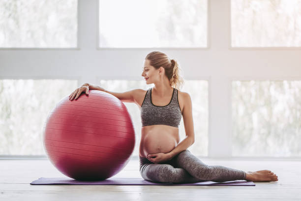 istock Pregnant woman workout. 904131872
