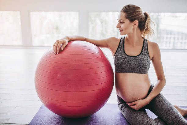 istock Pregnant woman workout. 904131882