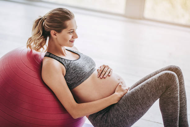 istock Pregnant woman workout. 904131940