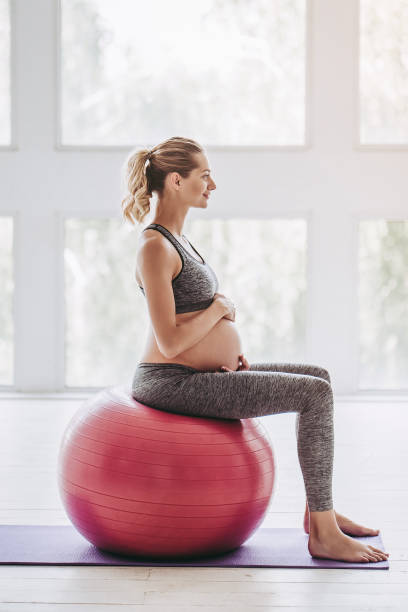 istock Pregnant woman workout. 904131994