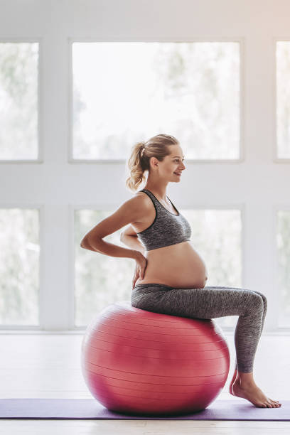 istock Pregnant woman workout. 904133274