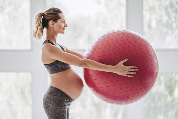istock Pregnant woman workout. 904133296