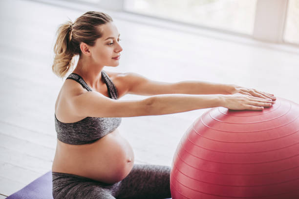 istock Pregnant woman workout. 904134106