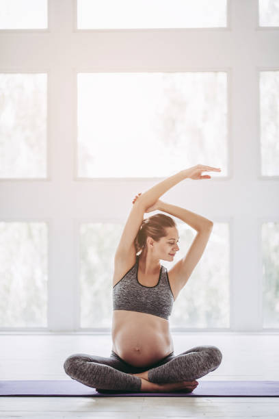 istock Pregnant woman workout. 904136156