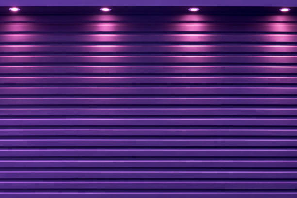 the purple shutter door with the light from spotlight background. - light shop imagens e fotografias de stock