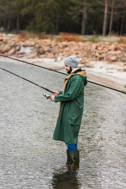 istock man fishing on lake 904146922