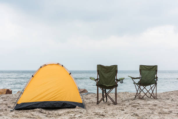 istock camping tent on seahore 904154224