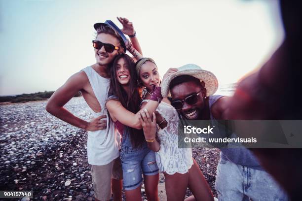 Young Multiethnic Hipster Friends Taking Selfies On Island Summer Vacation Stock Photo - Download Image Now