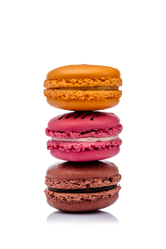 Three multi colored macaroons arranged in a stack isolated on white background. DSRL studio photo taken with Canon EOS 5D Mk II and Canon EF 100mm f/2.8L Macro IS USM