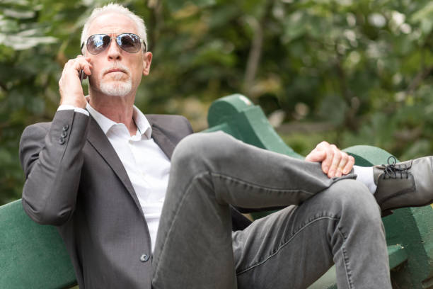 istock Mature man talking on mobile phone 904170222