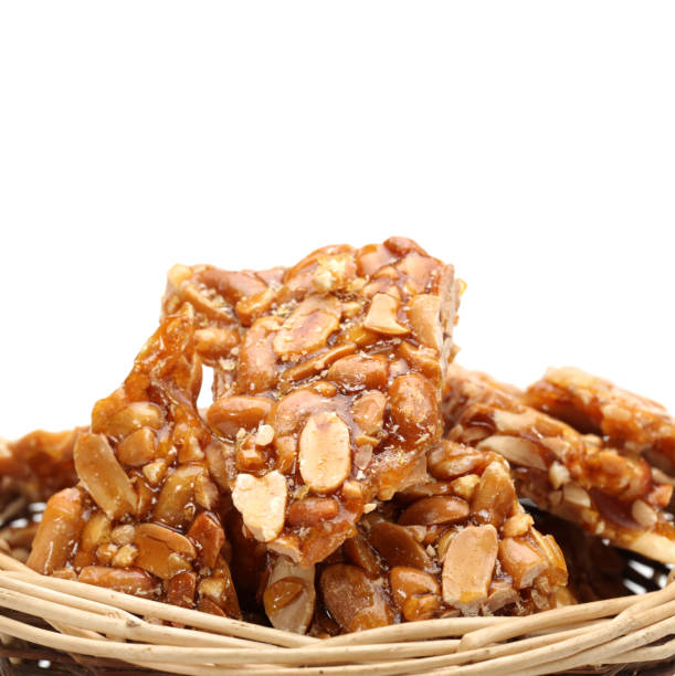 istock Bars with peanuts close-up isolated on white background 904172526