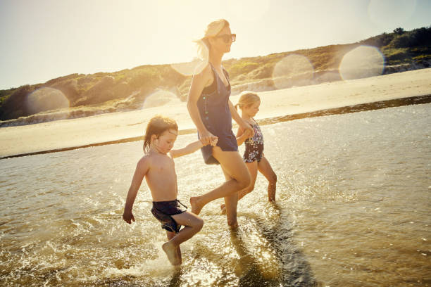 istock The beach is by far the best place to bond 904172552