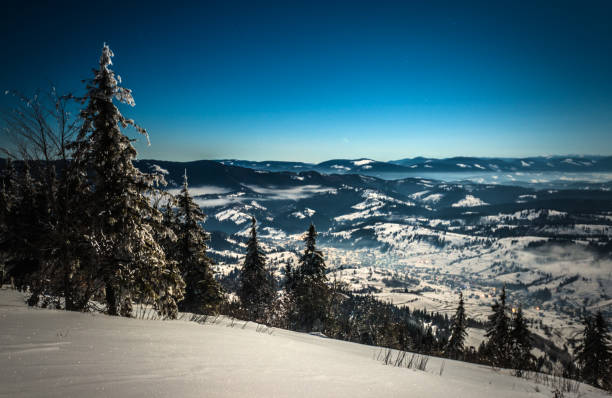 istock Night moon in the snowy mountains 904177622