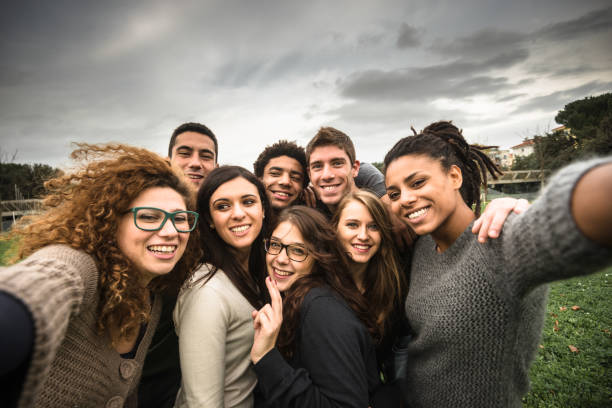 istock friends take a selfie at the park 904182774