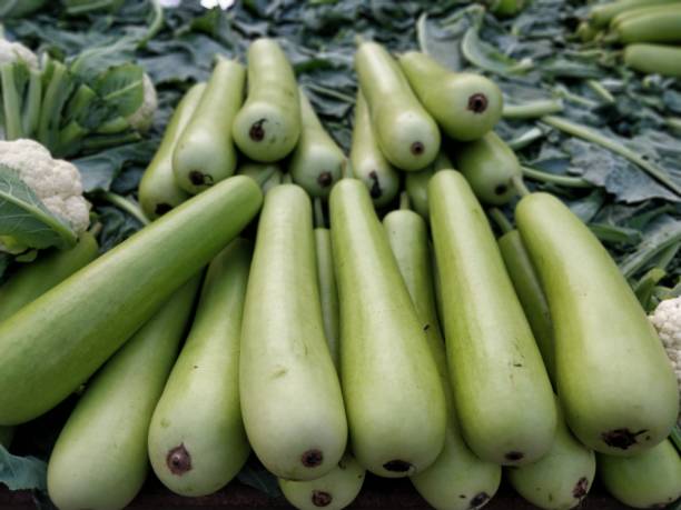 istock Raw green Calabash on display at Vegetable Stall 904183018
