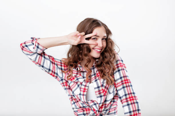 istock woman in plaid shirt 904186650