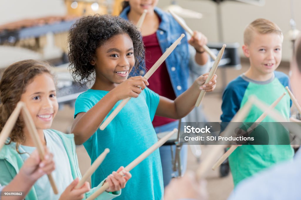 Child Using Percussion Instruments Elementary Students Learn To Play Percussion Instruments Stock Photo ...