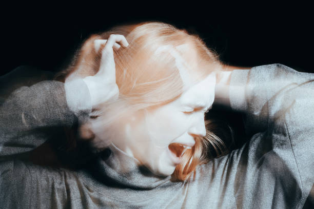istock Young woman with delusions screaming 904192440