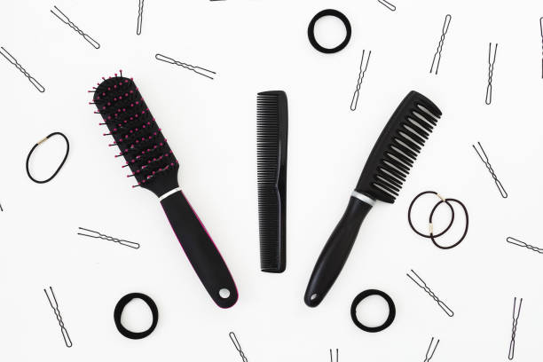 istock Tools for the hairdresser on white background. Beauty composition. Flat lay, top view 904194570