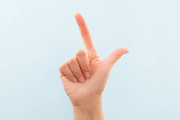 lenguaje de señas americano l. - letter l human hand human finger human thumb fotografías e imágenes de stock