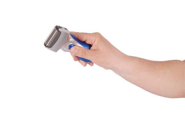 istock Electric shaver holding on hand 904196456
