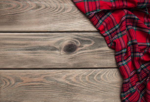istock Checkered napkin on a wooden background 904200666