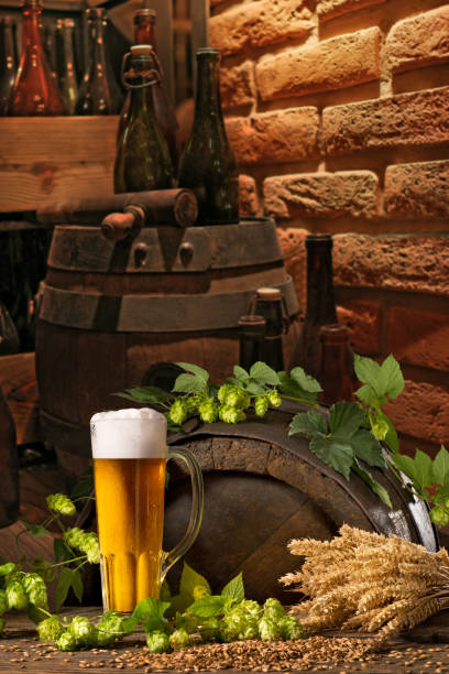 istock Beer glass with hops and barley in the brewery 904210746