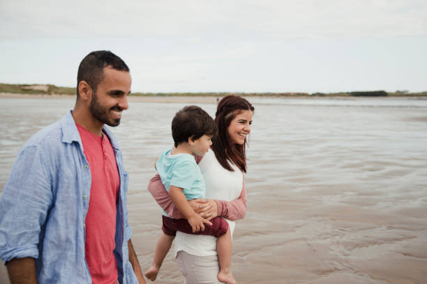 istock A Family Playing On The Beach 904212456