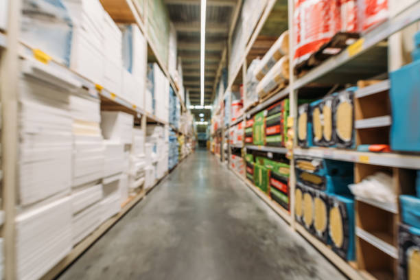 istock blurred view of shelves with boxes and styrofoam in warehouse 904215918