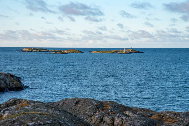 istock Lighthouse in ocean west of Sweden 904225122
