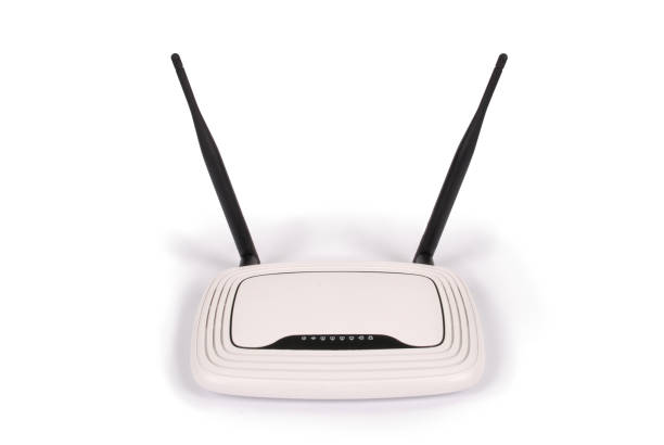 istock White WI-FI router with two antennas (clipping path) 904230202