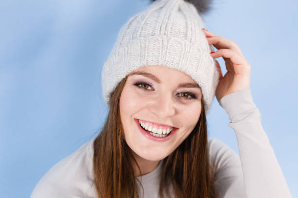 istock woman wearing winter wool cap portrait 904230240