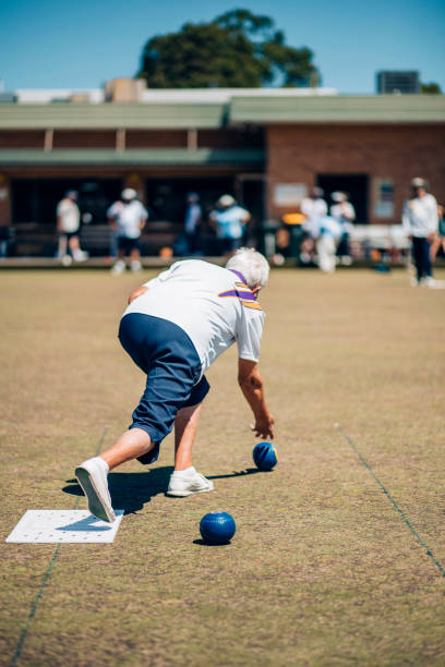 istock Senior Woman Playing Bowls 904234528