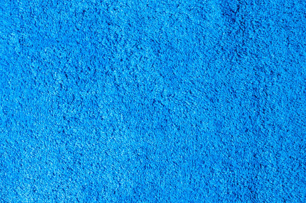 Blue cotton bath towel background Blue cotton bath towel background terry towel stock pictures, royalty-free photos & images