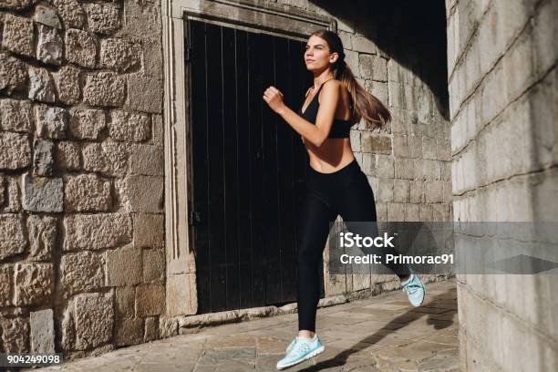 Run For The Life Stock Photo - Download Image Now - Jogging Pants, Black Color, Leggings