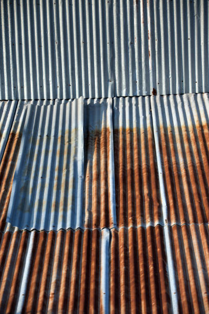 istock Pattern of Rusted galvanized iron plate , Old rusty zinc plate roof 904250746