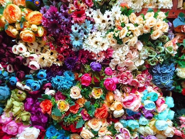 istock abstract background of many colorful artificial flowers 904253606